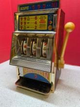 Casino seven 25 cent slot machine, metal and plastic