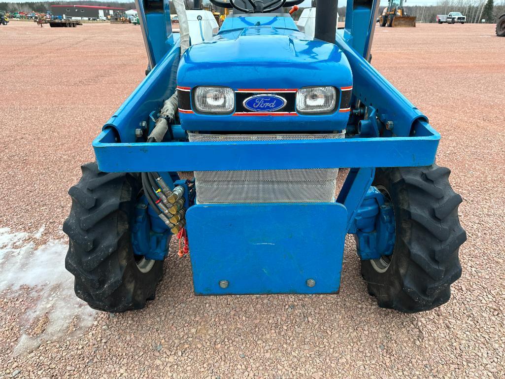 1992 Ford 2120 compact tractor, open station, 4x4, Ford 7109 loader, gear trans, bar tires, quick
