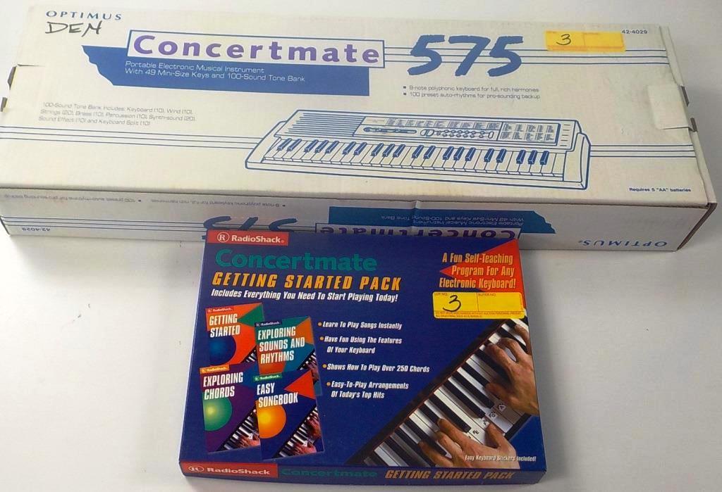 LOOKS NEW OPTIMUS CONCERTMATE 575 KEYBOARD AND BOOKS