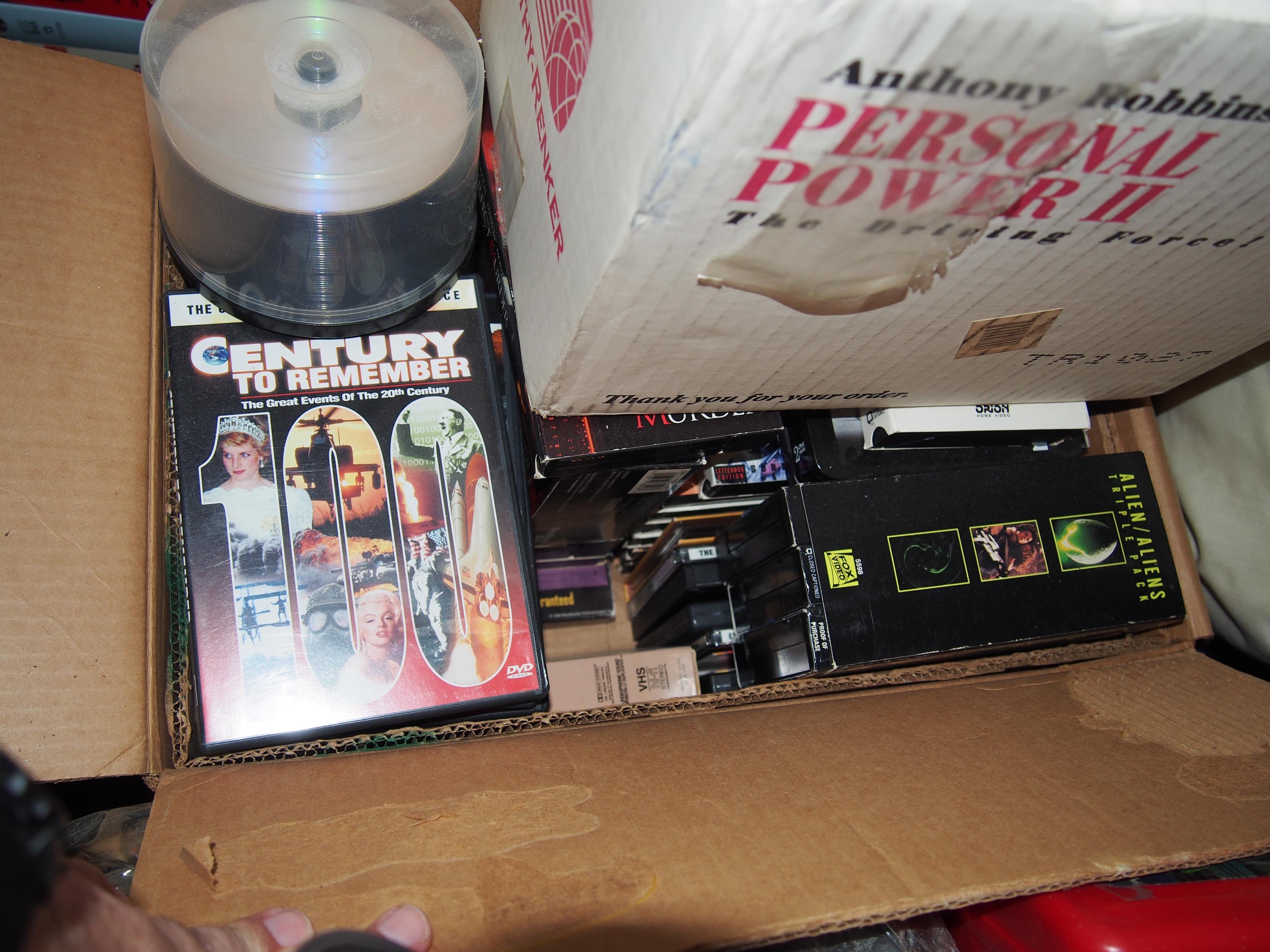 Box of miscellaneous DVDs and VHS