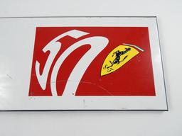 Ferrari '50th Anniversary' sign.