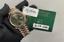 New 18kt Rose Gold 40mm DayDate 'Green Dial' Rolex comes with Box & Papers