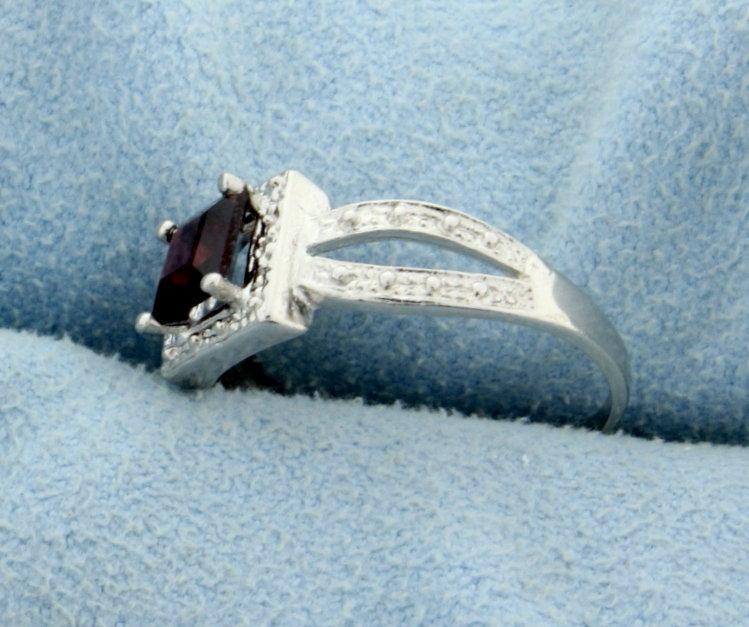 Garnet And Diamond Ring In Platinum Over Sterling Silver
