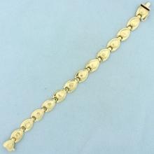 Abstract Designer Link Bracelet In 14k Yellow Gold