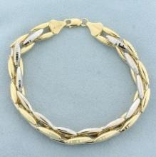 Two Tone Diamond Cut Geometric Link Bracelet In 14k Yellow And White Gold