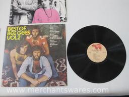 Three Vinyl Record Albums includes 2 Bee Gees: Greatest , Greatest Hits Vol. 2 with Pretty In Pink