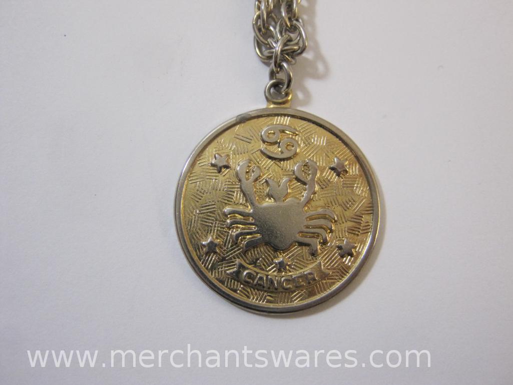 Gold Tone Necklaces, One with Locket and Pictures, and a Sarah Coventry Cancer Astrology Pendant