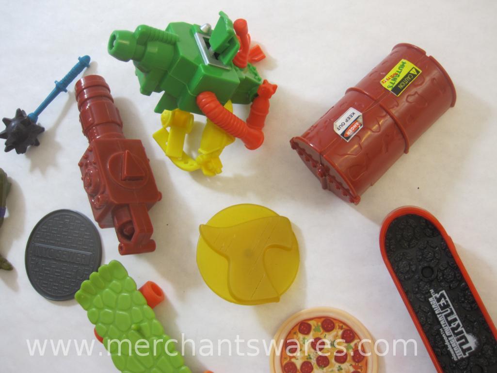 Assorted Teenage Mutant Ninja Turtles Pieces and Accessories, see pictures for included pieces, 5 oz