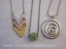 Three Silver Tone Necklaces with Pendants