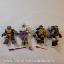 Four Teenage Mutant Ninja Turtles Action Figures including 2012 Ooze Scoopin' Donatello, 2012