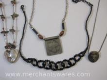 Four Costume Necklaces including Abalone Heart and more
