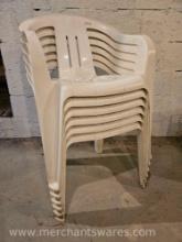 Six White Stacking Patio Chairs