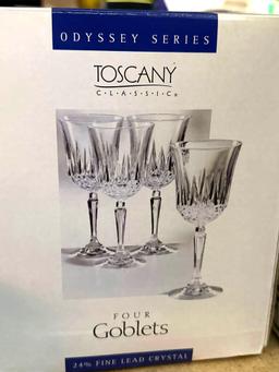 Four 24% Lead Crystal Goblets and Four Drinking Glasses with Gold Rims