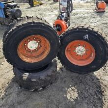 3 skidsteer tires and 2 rims