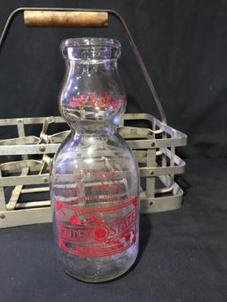 Antique milk bottle carrier with Golden State dairy (buttermilk) bottle