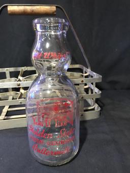 Antique milk bottle carrier with Golden State dairy (buttermilk) bottle