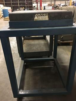 Metal cart with stone piece