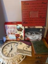 guitar book and DVD set, crystal bowl, sketchpad, and antique album