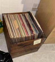 wooden crate, full of 33 RPM vinyl records