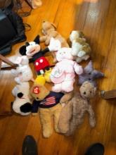 box of plush toys, including TY and Mickey Mouse