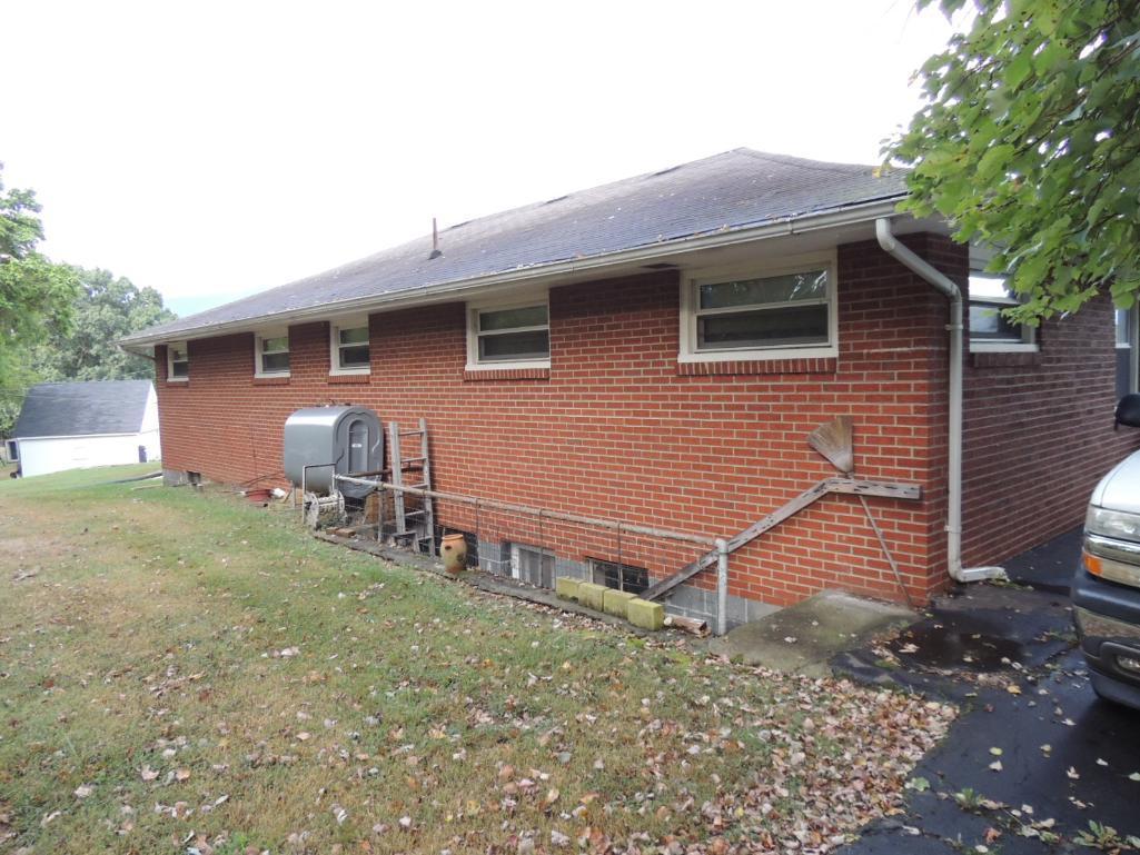 Real Estate Auction - One Level Brick Home