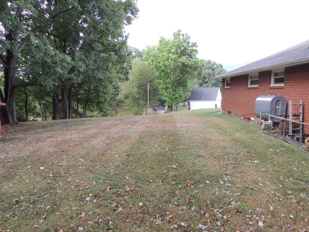 Real Estate Auction - One Level Brick Home