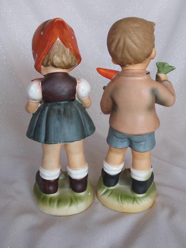 Two Erich Stauffer Hummel' 26cm figurines.