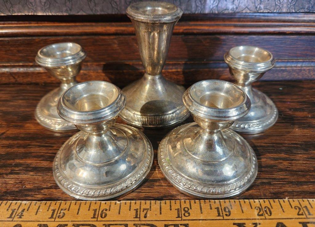 Collection of weighted Sterling Silver Candle Holders