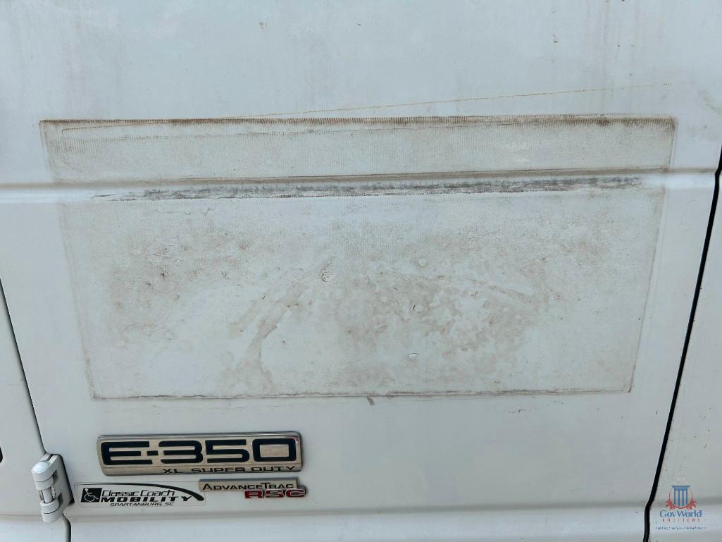 2009 Ford Econoline Wagon Van, VIN # 1FBNE31L99DA45904
