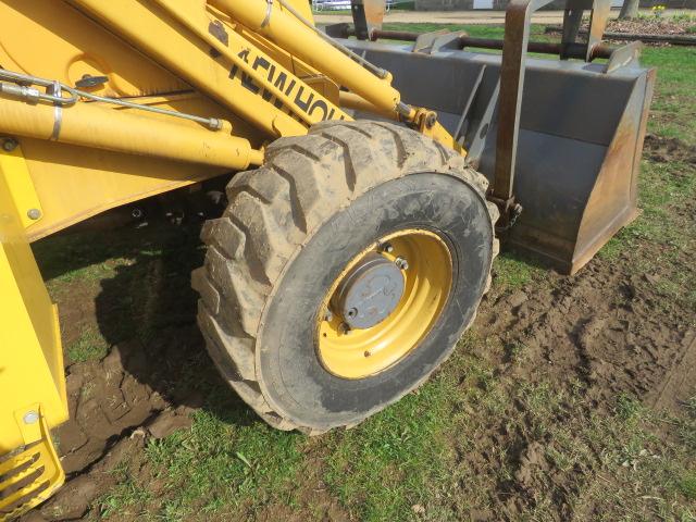 FORD/NEW HOLLAND 575E BACK HOE DIESEL 6760 HRS
