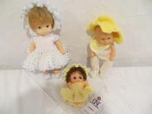 3 baby dolls with crocheted clothes