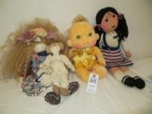 4 stuffed dolls