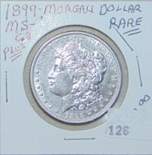 1899 Morgan Dollar (good date, cleaned).