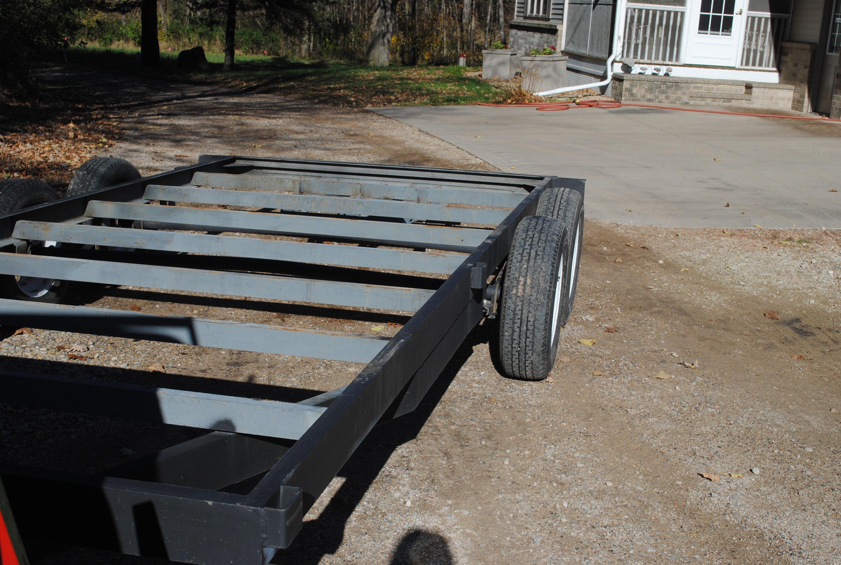 7' wide x 18' long flatbed car trailer frame with brand new ramps, new 3500# Dexter axles & new tire