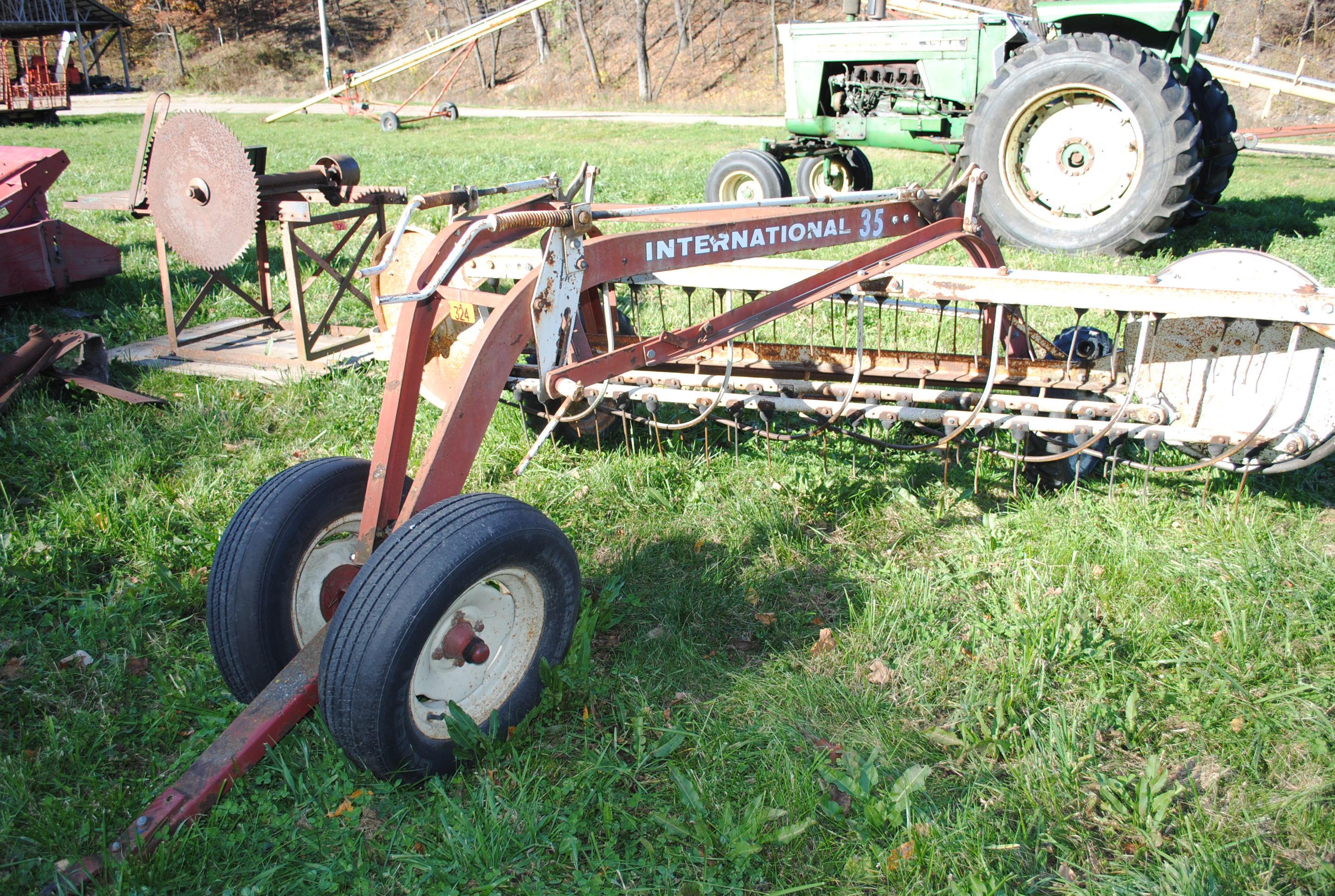 IH #35 rake with front dolly wheels, rubber mounted teeth