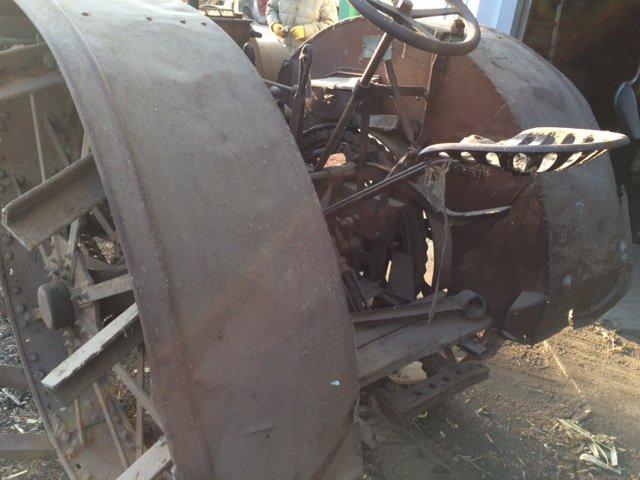1020 Titan, complete, unrestored. Not running, engine is loose. Lugs for RR are there but not on rim