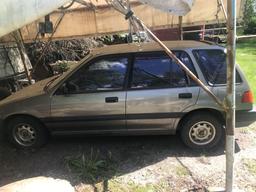 1990 Honda Civic w/auto on floor, bucket seats, a/c, 4 dr., 4 cyl, 188,960 miles, taupe