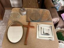 Various shapes of mirrors, wood cross, etc