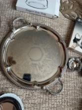 4 silver plated candy dish with folding carrying handle, misc. trays and platters....Shipping