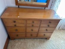 12 drawer dresser with matching wall mirror.