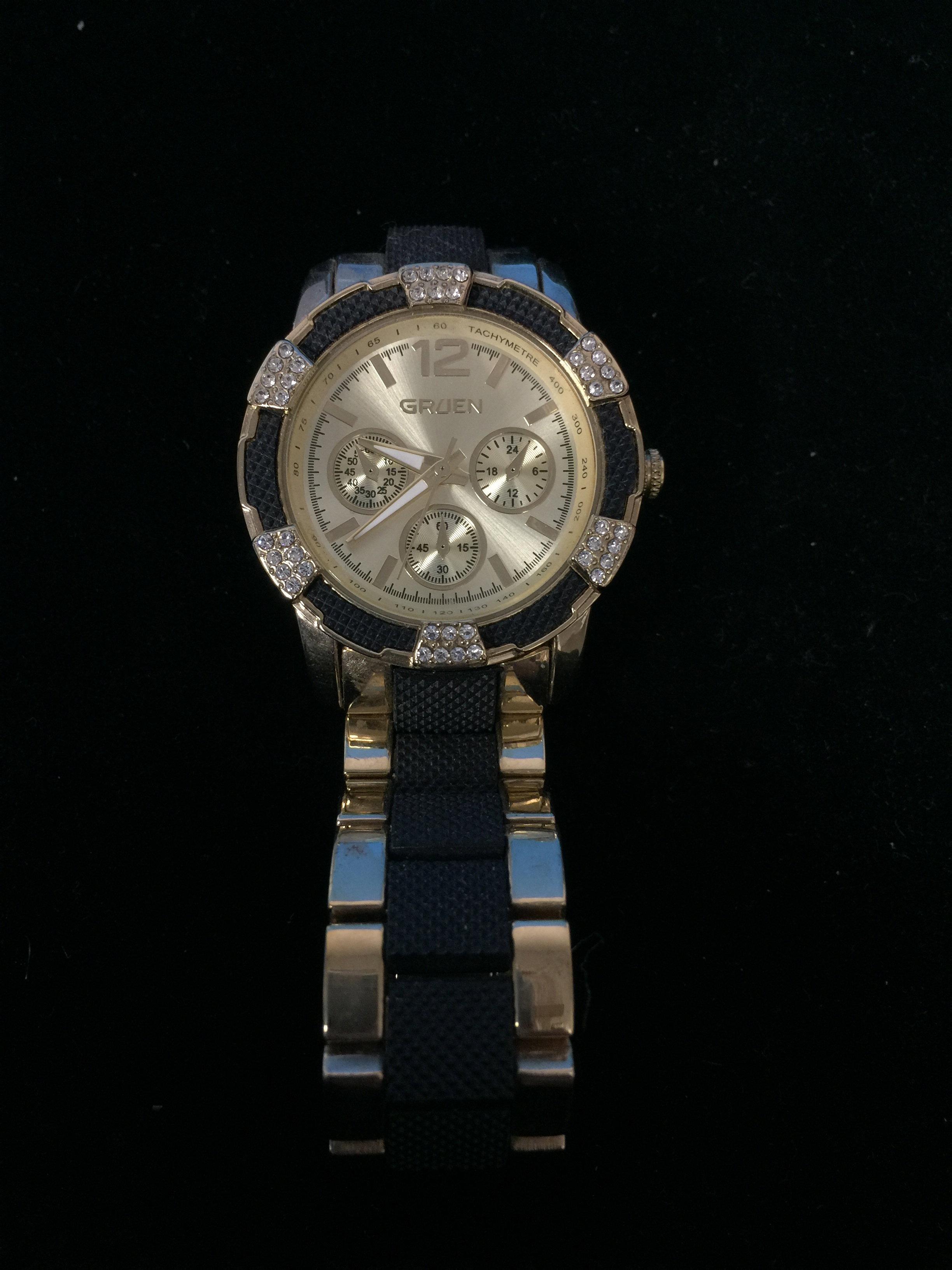 Men's Gruen Black and Gold Tone Watch with Instructions