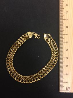 Italian Designed 14 Karat Yellow Gold Braided 7" Bracelet - 7.7 Grams