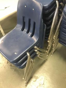 42- Blue plastic school chairs