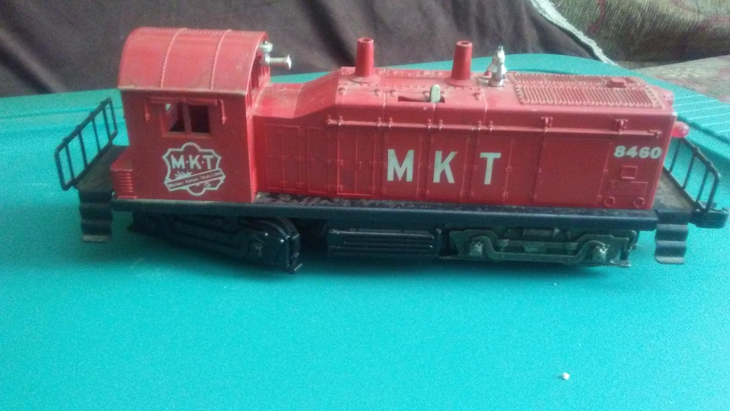 Lionel MKT Red Engine 8010-11 and Lionel Rutland Boxcar