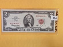 Two Crisp About Uncirculated Two Dollar Red Seal notes