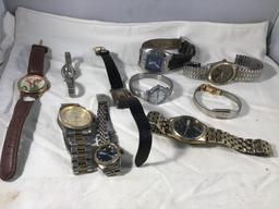 10 miscellaneous watches.  Two Rolex repro.