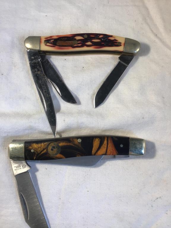 4 pocket knives, sharpening stone.  Winchester,
