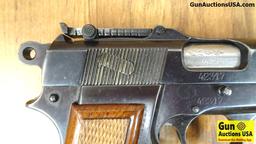 FABRIQUE NATIONALE D'ARMES de GUERRE HERSTAL BELGIQUE HI-POWER 9MM Semi Auto Pistol. Very Good Condi