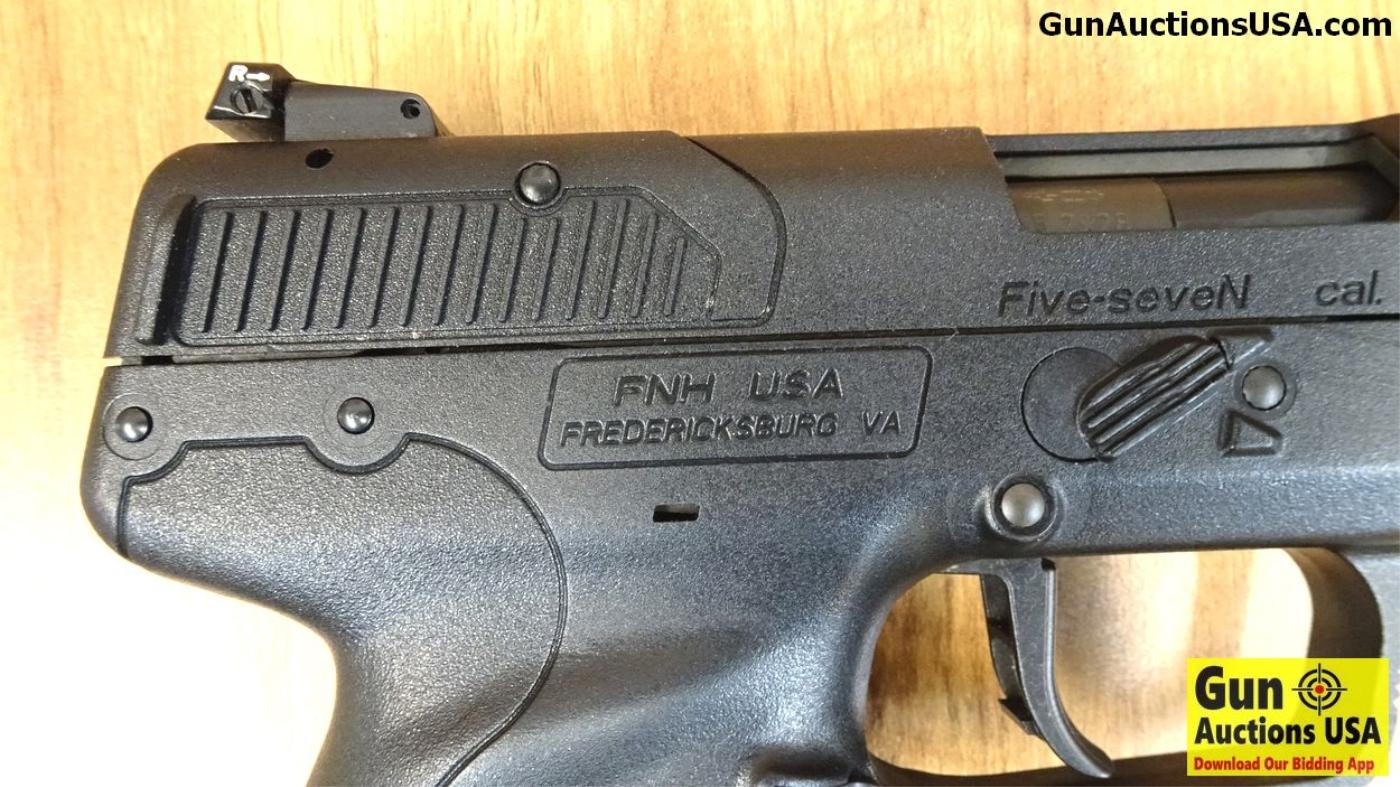 FNH Five-seveN 5.7 X 28 MM Semi-Auto Pistol. NEW in Box. 5" Barrel. Shiny Bore, Tight Action This is