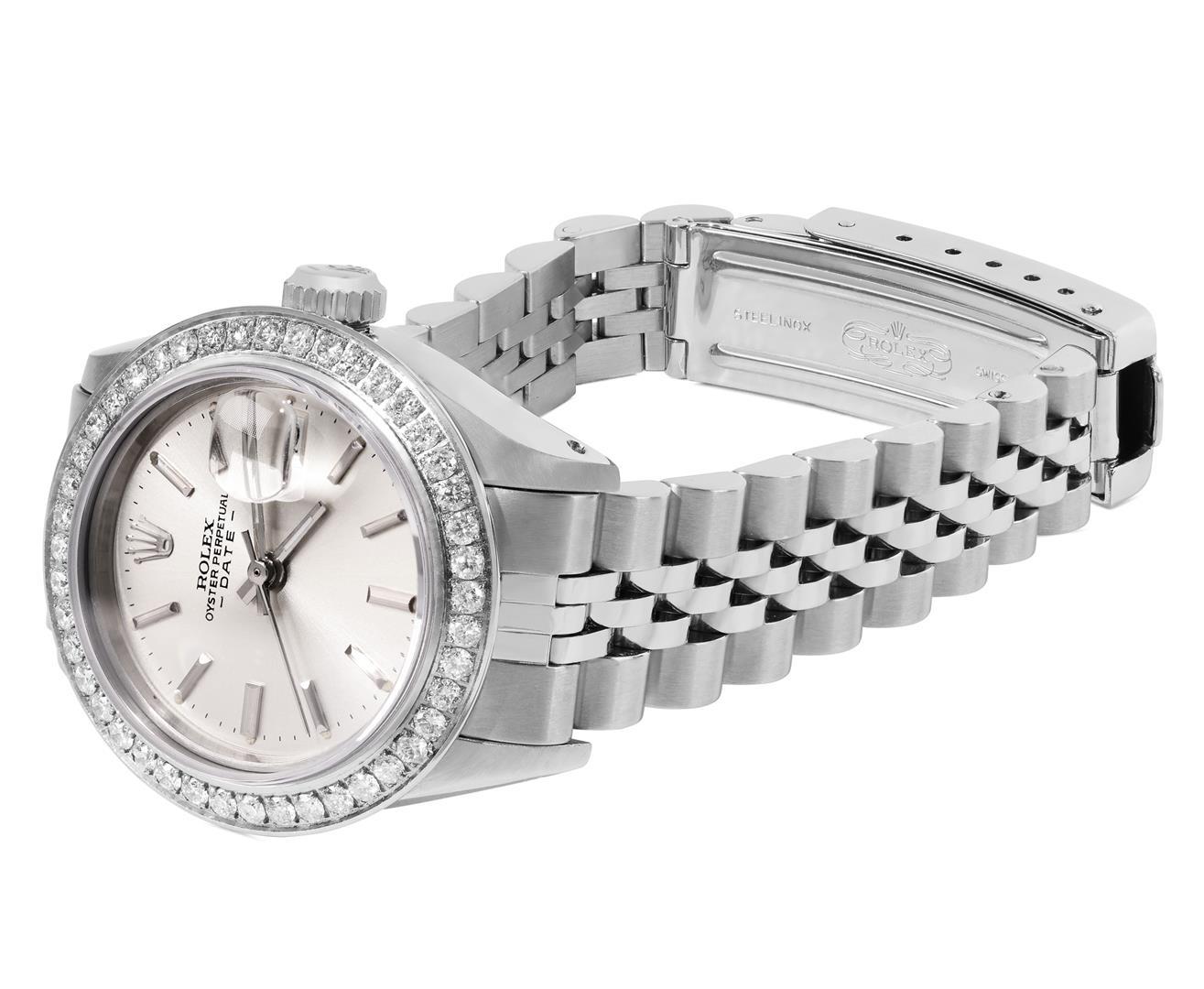 Rolex Ladies Stainless Steel Silver Index 18K White Gold Pave Bezel Date Watch